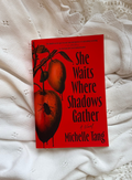She Waits Where Shadows Gather